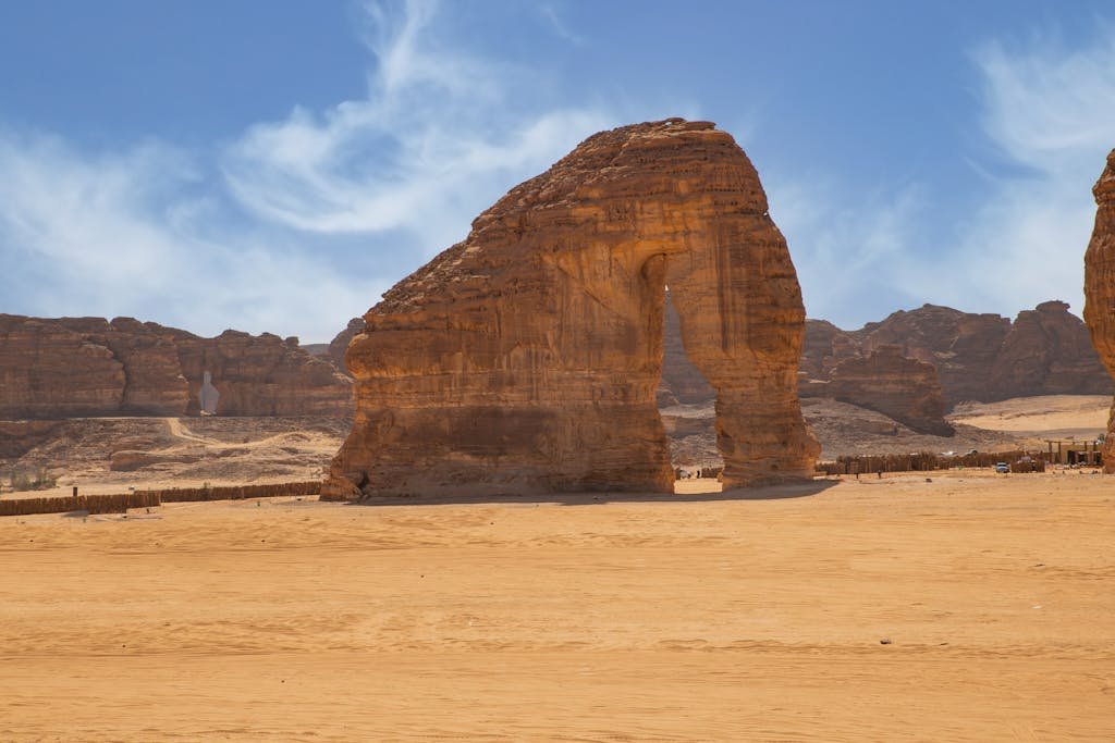 Stunning view of Elephant Rock under a clear blue sky in Saudi Arabia's desert.